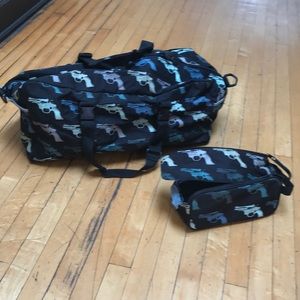 Andy Warhol 38 special gun duffel bag with matching toiletry bag